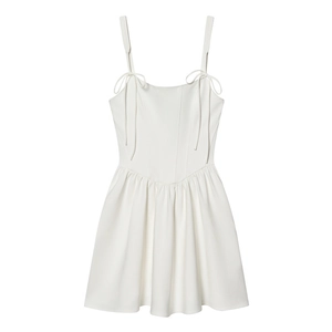 Detail of white mini dress with bow-tie shoulder straps and corset style bodice structure