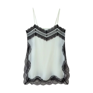 Detailed view of cream silk camisole with black eyelash lace trim and S size tag