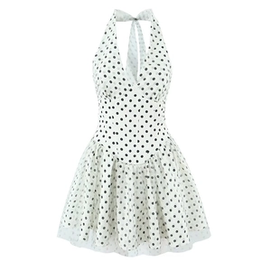 Chic white halter dress with black polka dots and airy mesh layers in a stylish flared cut