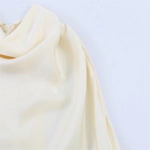 Elegant ivory satin cowl neck dress featuring soft silk texture and minimalist luxury style