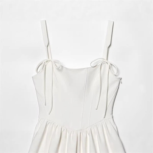 White embroidered layered tulle blouse with slim fit and elegant bow shoulder straps