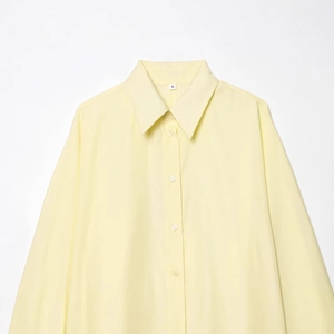 Women's loose-fit long sleeve poplin polo shirt in light yellow with button-down collar