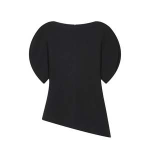 Detail of black puff sleeve top with elegant wide neckline and asymmetric hem design