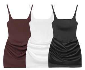 Close-up of ruched mini dresses with spaghetti straps and corset-style waist in three colors