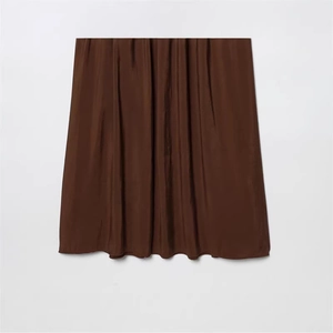 Elegant dark brown satin maxi dress featuring a glossy silk texture and flowing silhouette