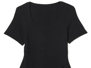Detailed view of black short sleeve knit top with deep U-neckline and ribbed texture