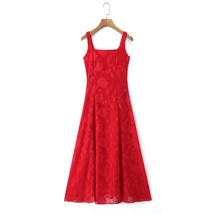 Detail view of red square neck sleeveless dress featuring intricate floral jacquard texture