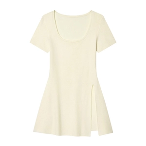 Macro view of short sleeve knit dress showing side slit detail and fine ribbed texture