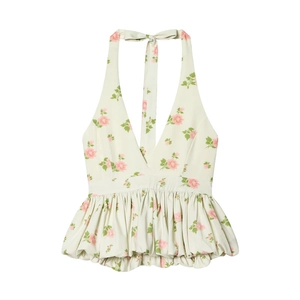 Halterneck-Top mit tiefem V-Ausschnitt und Schößchensaum im floralen Muster