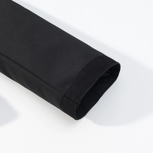 Detail of high-quality black jacket cuff featuring elastic ribbed windproof design