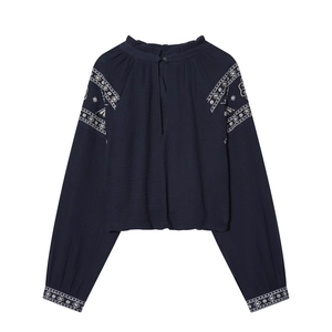 Navy blue loose embroidered blouse with ruffled high neck and long sleeves in textured fabric