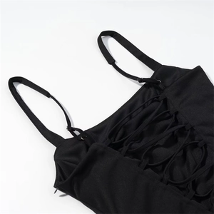 Detail of cross-straps and lace-up back on this sexy black sleeveless mini dress