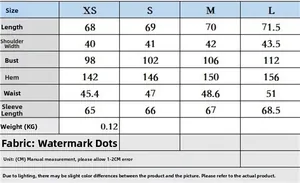 Detailed size chart for the polka dot blouse with measurements in centimeters
