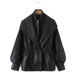 Close-up of black PU leather jacket featuring wide lapels and silver metallic zipper