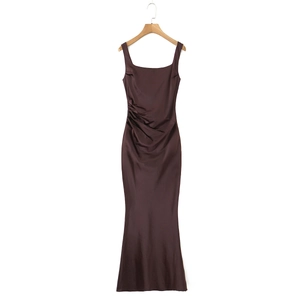 Detail of elegant chocolate brown satin dress with ruched waist and square neckline