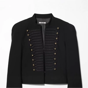 Women's black military style jacket with padded shoulders and gold buttons