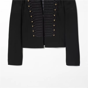 Women's black military jacket with gold buttons and braided trim in Napoleonic style