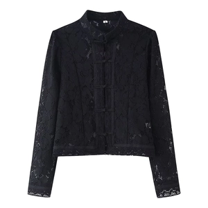 Close-up of black floral lace shirt with mandarin collar and traditional knot buttons