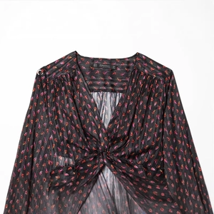 Women's V-neck long sleeve floral top with front twist knot and subtle vertical stripes