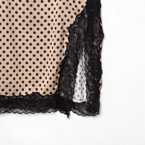 Elegant polka dot satin maxi dress with black lace trim detailing and side slit