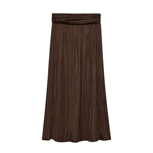 Detailed view of dark brown pleated satin midi skirt with elastic high waist design