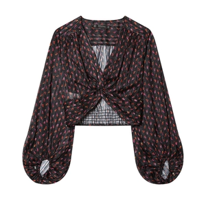 Women's V-neck cropped floral blouse with long lantern sleeves and front knot detail