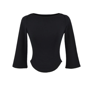 Detail of boat neck black top with flared sleeves and unique curved scallop hem