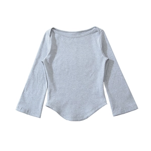Detail of light grey boat neck top featuring curved hem and delicate lettuce edge stitching