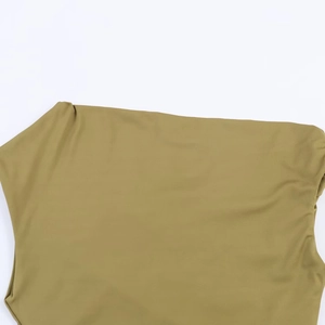 Detail shot of the olive green stretchy fabric showing fine texture and soft drape