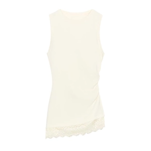 Detail of cream sleeveless top with side ruching and asymmetric lace hem finish