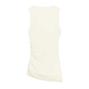 Detail of cream sleeveless top with side ruched texture and delicate lace trim hem