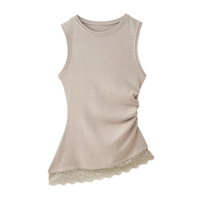 Detail of tan ribbed knit top with drawstring gathering and delicate lace hem trim