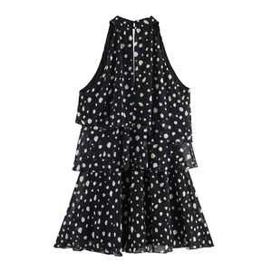 Polka dot halter tiered dress in black featuring three-layer ruffled chiffon skirt