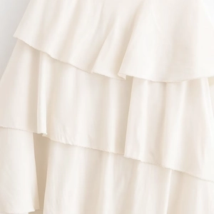 Gonna a balze bianca in chiffon traspirante con eleganti dettagli plissettati