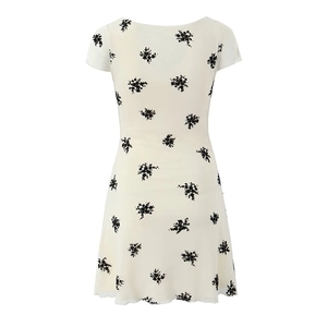 Back view of slim fit short sleeve white dress with black floral print pattern