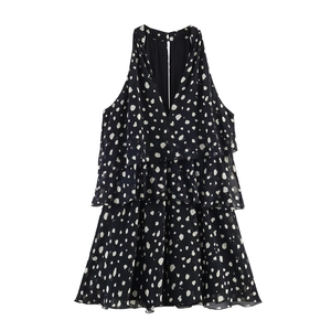 Polka dot sleeveless tiered dress with halter neck and deep V-neck in black and white