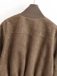 Detail of brown suede jacket showing the premium ribbed knit collar and texture