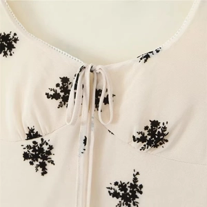 Floral print slim dress with lace-trimmed U-neckline and tie-up front detail