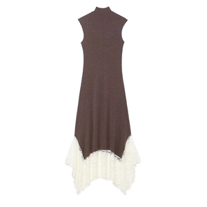 Detail of a dark brown knit dress featuring an elegant white lace拼接 asymmetric hemline