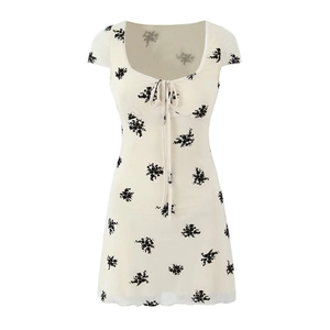 Slim fit beige floral short sleeve dress with U-neck lace trim and front bow detail