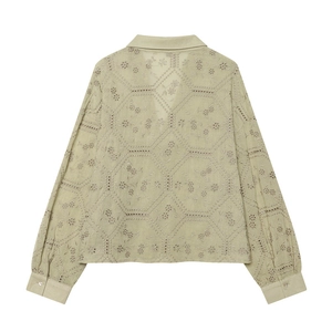 Sage green long sleeve shirt featuring intricate geometric embroidery and eyelet details