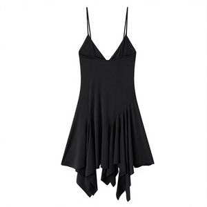 Detail view of black asymmetric dress with thin spaghetti straps and ruffled hem design