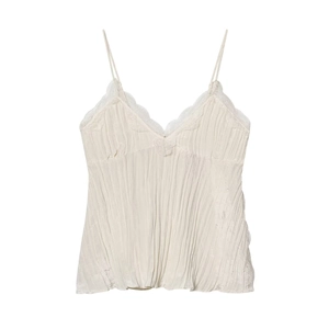 Detailed view of ivory pleated camisole featuring delicate lace trim and fine pleats