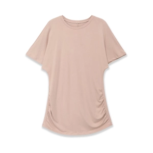 Detail of gathered side ruching on a pink slim-fit short sleeve crewneck T-shirt