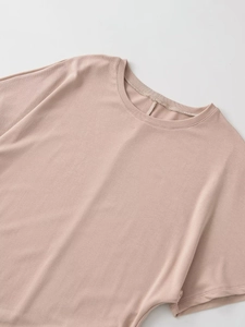 Detail shot of the ribbed texture and premium stitching on this light brown crewneck tee