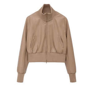 Macro detail of ribbed stand collar and texture on beige faux leather bomber jacket