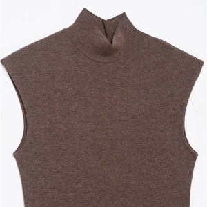Dark coffee sleeveless turtleneck knitted top with soft texture and refined ribbed details