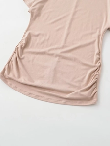 Close-up of side ruching details on a slim fit short sleeve t-shirt with soft fabric