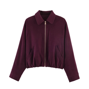 Close-up of wine red suede jacket featuring turn-down collar and metallic front zipper