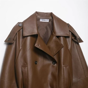 Elegant brown faux leather short trench coat with double-breasted buttons and lapels
